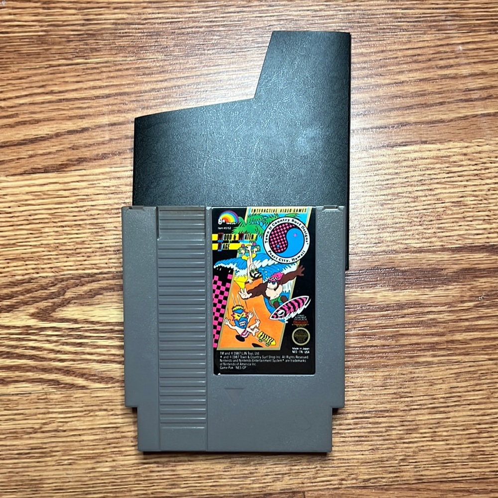 Nintendo Original NES - 1987 Wood & Water Rage Video Game & Storage Sleeve - Picture 1 of 3